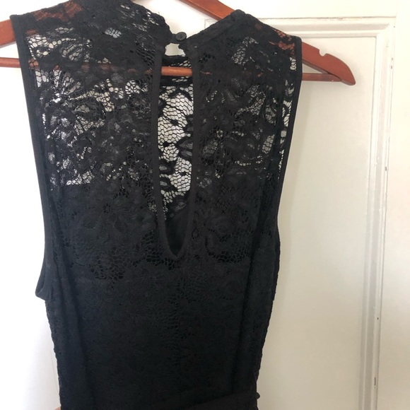 Black romper, Eclipse size M, fits size 8-10. Hand wash, 100% polyester - Picture 5 of 11